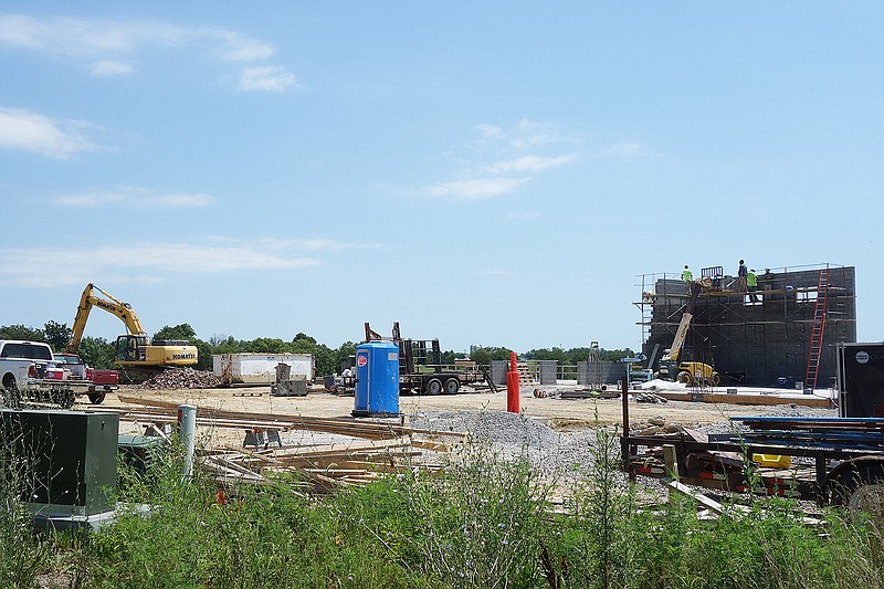 There are blue skies ahead for the new Callaway County Ambulance District headquarters. The damaged main building has been demolished following an April fire and will be rebuilt, and the adjacent apparatus bay is well underway.