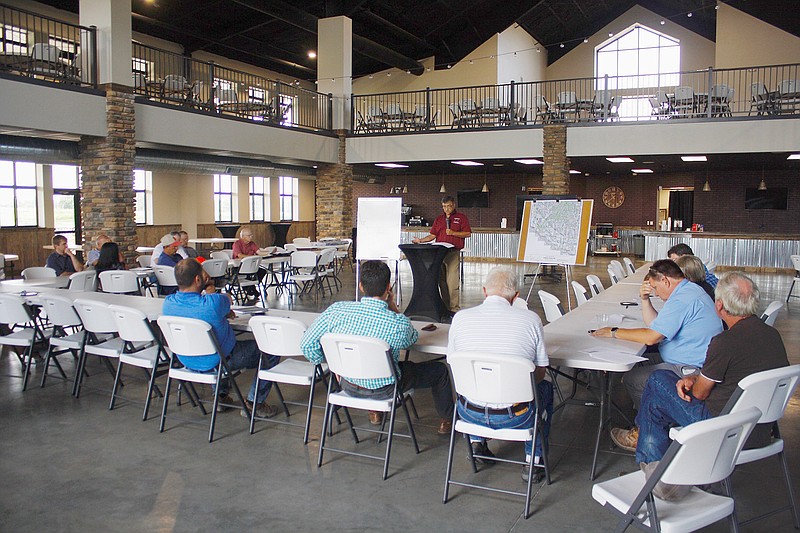 Callaway County Western District Commissioner Roger Fischer speaks at a meeting Wednesday, July 17, 2019, at the Capital Bluffs Event Center in north Jefferson City. The meeting served as a follow-up to a meeting held in June concerning south Callaway stakeholders affected in the flooding.