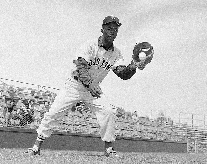In this April 1959 file photo, Boston Red Sox's Elijah "Pumpsie" Green poses for a photo, location not known. Green, the first black player on the Red Sox, has died. He was 85. A Red Sox spokesman confirmed his death Wednesday night, July 17, 2019. (AP Photo/Harold Filan, File)