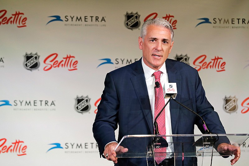 Ron Francis talks to reporters, Thursday, July 18, 2019, in Seattle after he was introduced as the first general manager for Seattle's yet-to-be-named NHL hockey expansion team.  (AP Photo/Ted S. Warren)