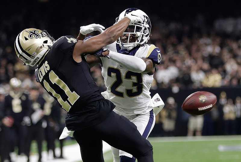 In this Jan. 20, 2019, file photo, Los Angeles Rams' Nickell Robey-Coleman breaks up a pass intended for New Orleans Saints' Tommylee Lewis during the second half of the NFL football NFC championship game in New Orleans. A Louisiana judge won't stop a lawsuit against the NFL over the playoff "no-call" that led to the Rams defeating the Saints and advancing to the 2019 Super Bowl. State Civil District Court Judge Nicole Sheppard ruled Thursday, July 18, 2019 in the damage suit filed by attorney Antonio LeMon. (AP Photo/Gerald Herbert, File)