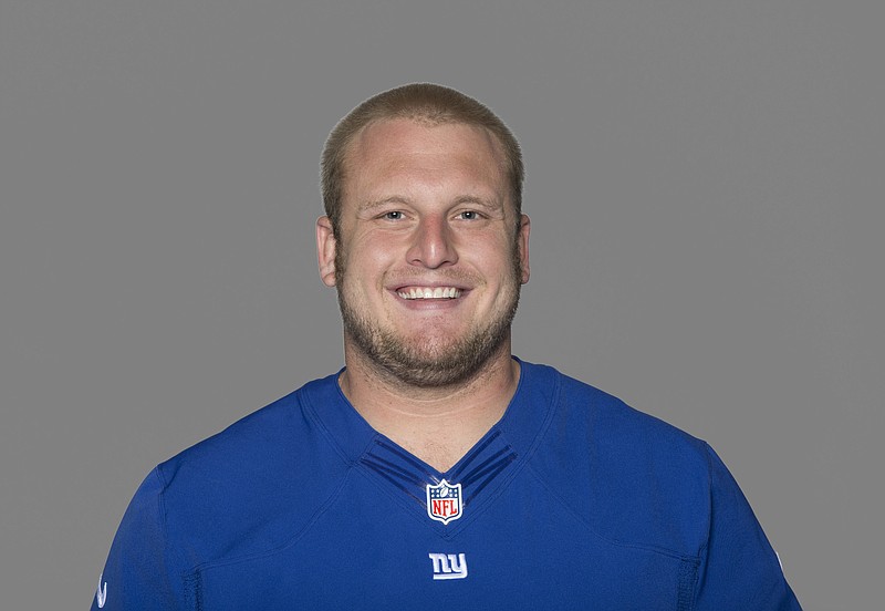 This 2012 file photo, shows Mitch Petrus of the New York Giants NFL football team. Officials say Petrus, a former Arkansas offensive lineman who later won a Super Bowl with the New York Giants, has died in Arkansas of apparent heat stroke. He was 32.  Pulaski County Coroner Gerone Hobbs says Petrus died Thursday, July 18, 2019, at a North Little Rock hospital. Hobbs says Petrus had worked outside all day at his family shop, and that his cause of death is listed as heat stroke. (AP Photo/File)