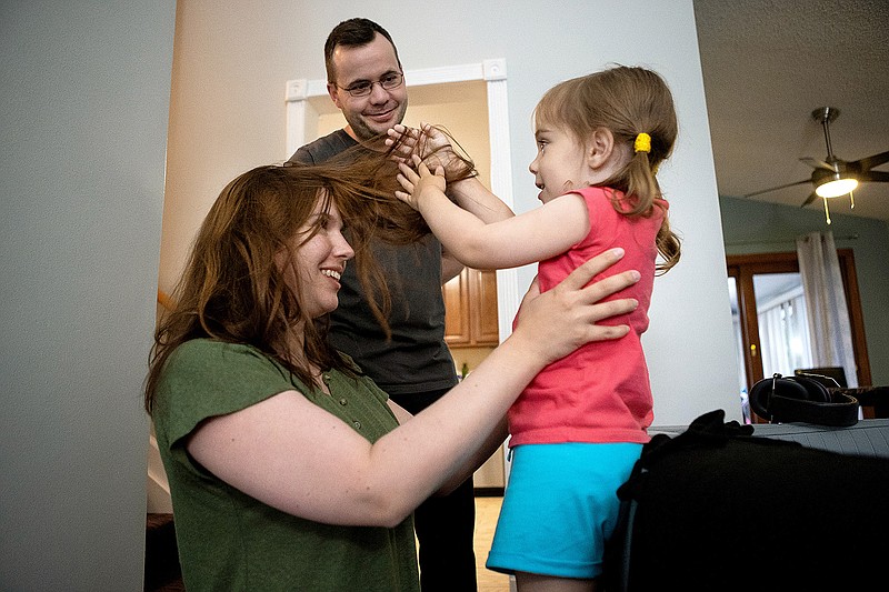 Shawn Stevens and Courtney Stevens, whose 3-year-old daughter, Selena, has autism, pay nearly $1,500 in a month in medical bills.  (Robert Gourley/Los Angeles Times/TNS)