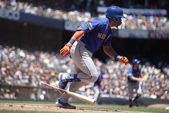 New York Mets' Dominic Smith drops his bat after hitting an RBI single off San Francisco Giants' Jeff Samardzija in the fourth inning of a baseball game Saturday, July 20, 2019, in San Francisco. (AP Photo/Ben Margot)
