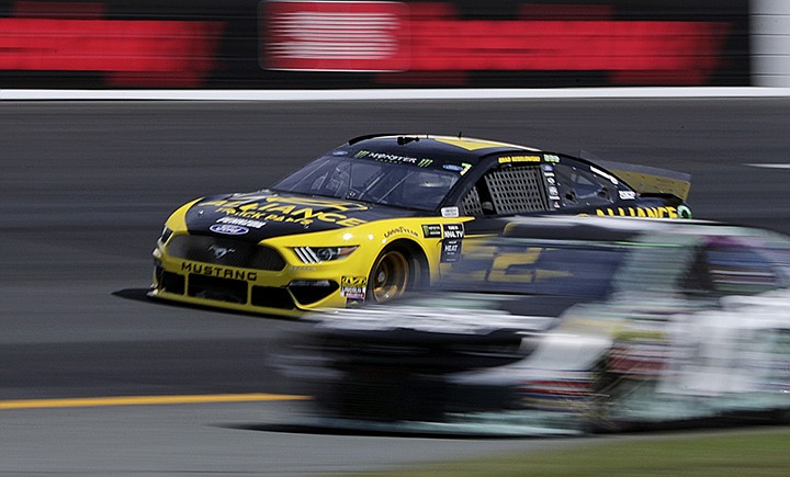 Pole sitter Brad Keselowski (2) passes slower cars during a NASCAR Cup Series auto race practice at New Hampshire Motor Speedway in Loudon, N.H., Saturday, July 20, 2019. (AP Photo/Charles Krupa)