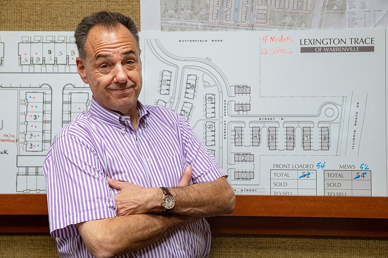 Jeff Benach, co-owner of Lexington Homes poses for a portrait Tuesday, July 16, 2019, inside his office in Chicago. Lexington Homes, which has townhouse and single-family developments in the Chicago area, has been building smaller projects than in the past, Benach said.