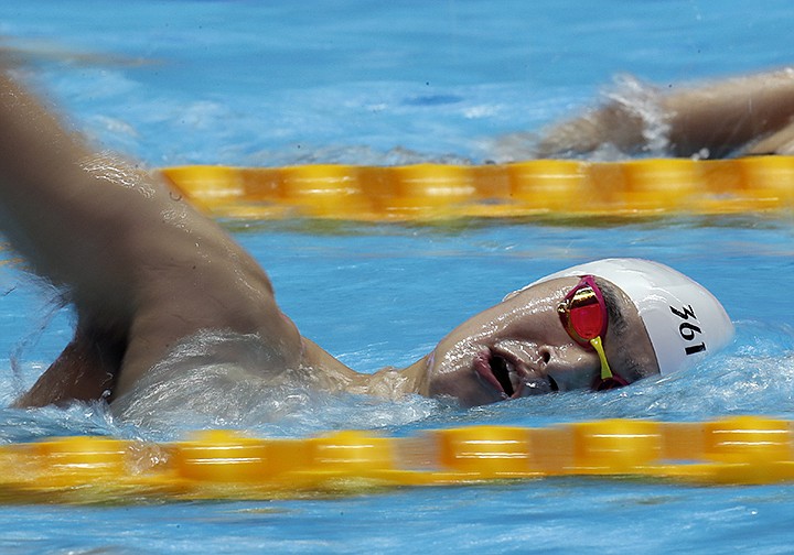 China's Sun Yang swims during a training session at the World Swimming Championships in Gwangju, South Korea, Saturday, July 20, 2019. (AP Photo/Lee Jin-man)