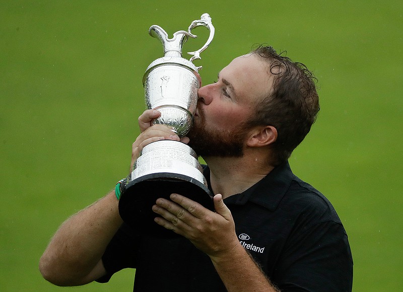  Ireland's Shane Lowry holds and kisses the Claret Jug trophy after winning the British Open on Sunday at Royal Portrush in Northern Ireland.