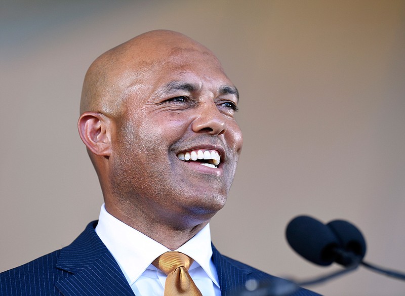  Former New York Yankees pitcher and National Baseball Hall of Fame inductee Mariano Riveara speaks Sunday during the induction ceremony at the Clark Sports Center in Cooperstown, N.Y. 