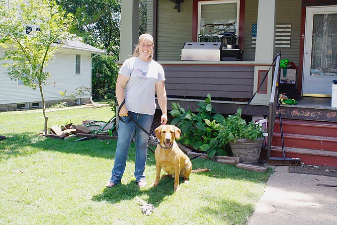 Leslea Alexander is pictured with her dog, Jake. Alexander is a native Callawegian, having lived in Fulton her entire life, and is currently a music teacher at Bush Elementary.