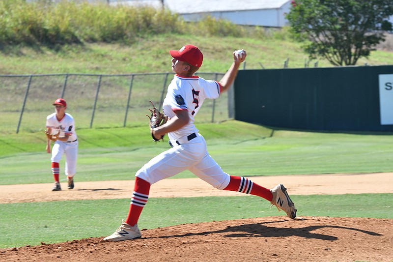 Texarkana Bulldog pitcher Cooper Perry delivers a pitch against Ballinger during a first-round game of the American Legion Texas state tournament Wednesday in Brenham, Texas. Perry pitched a 3-hit complete game to help the Bulldogs win, 7-1. (Photo by Kevin Sutton)
