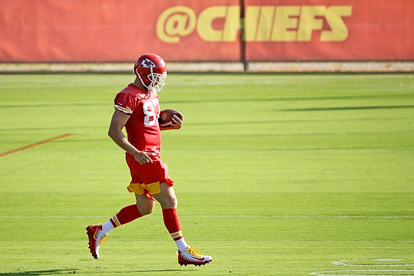 Chiefs tight end Travis Kelce runs a drill during training camp Wednesday in St. Joseph.