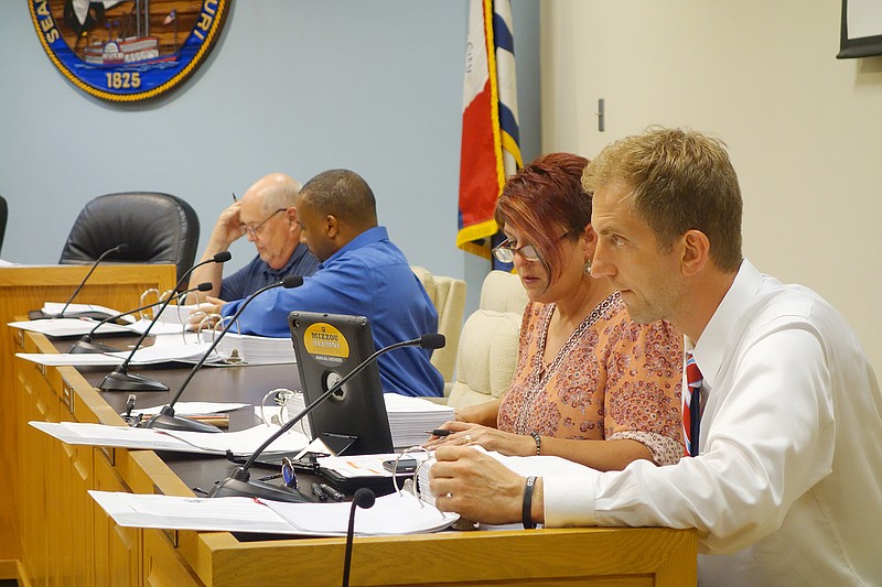 From right, Council members David Kemna, Laura Ward, Carlos Graham and Mark Schreiber look over the proposed mayor-approved 2020 fiscal year budget during the July 29, 2019, Jefferson City Budget Committee meeting.