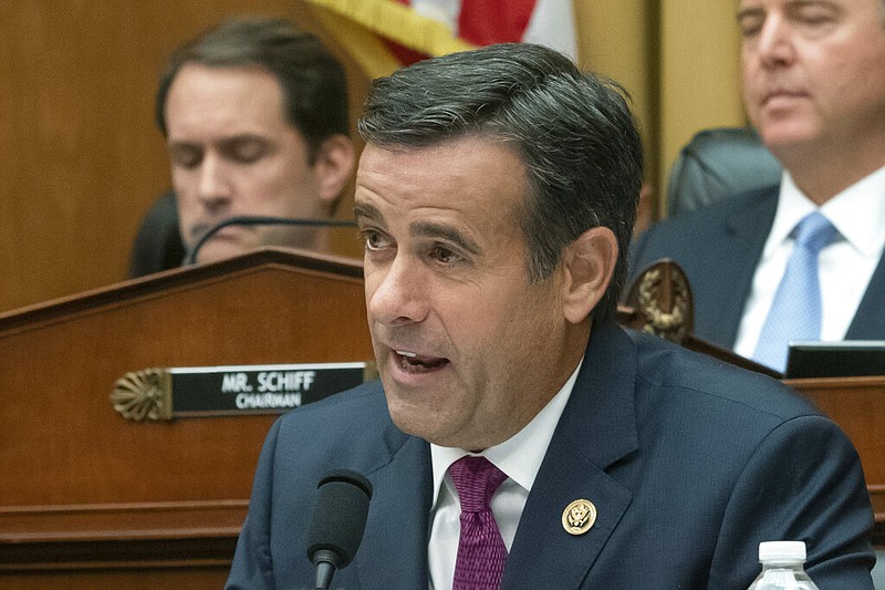 In this Wednesday, July 24, 2019 photo, Rep. John Ratcliffe, R-Texas, a member of the House Intelligence Committee, questions former special counsel Robert Mueller as he testifies to the House Intelligence Committee about his investigation into Russian interference in the 2016 election, on Capitol Hill in Washington. President Donald Trump announced Sunday, July 28 that he will nominate Rep. Ratcliffe to replace Director of National Intelligence Dan Coats, who is leaving his job next month. 