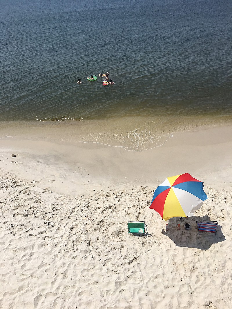 Gulf waters had many faces at Dauphin Island from calm to angry. Here it is in one of its more tranquil moments. 
