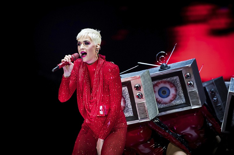 In this June 14, 2018 file photo, singer Katy Perry performs on stage at the 02 Arena in London. A Christian rapper who won a nearly $3 million judgement over Perry's hit "Dark Horse" used his song's millions of plays on YouTube and Spotify as evidence that Perry and her team may have heard it and then stole it. The Perry trial that ended Thursday, Aug. 1, 2019, with a win for rapper Marcus Gray showed that streaming services and other technology may be proving challenging for copyright law. (Photo by Vianney Le Caer/Invision/AP, File)