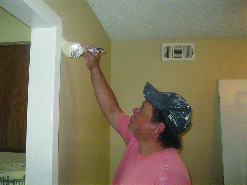 Construction workers and interior painters continue to work on remodeling the Parkside Apartment complex at 1400 East 35th Street in Texarkana, Ark.