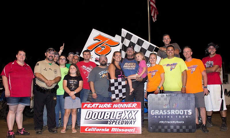 <p>Photo courtesy of Carol Wirts</p><p>With his ninth Double-X victory of the season, Tyler Blank claimed the title of 2019 Double-X 360 winged sprint point champion. Blank is pictured with team members as well as race sponsor, Officer Jim Clark, of Central Missouri Security Services, and Double-X Directory A.J. Wirts.</p>