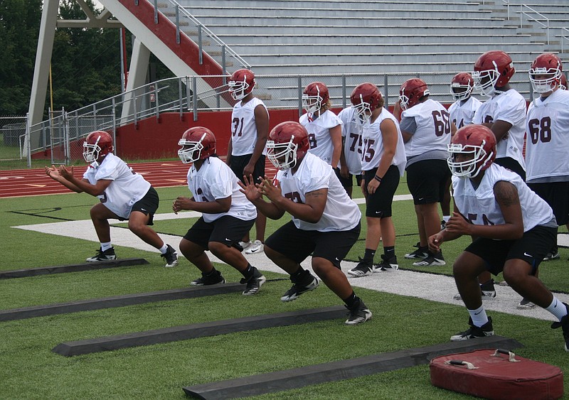 Arkansas High linemen go through drills Monday afternoon at Razorback Stadium in Texarkana, Ark. Monday was the first day of two-a-days for the 2019 high school football season.