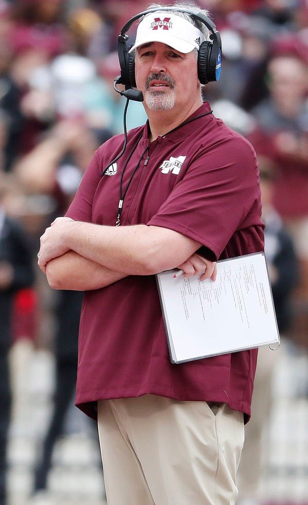 In this April 13 file photo, Mississippi State football coach Joe Moorhead observes his team's spring game in Starkville, Miss.
