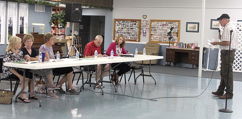 Darrell Hendrickson, chairman of the environmental health study group, presents his group's recommendation on monitoring the air and water quality of Moniteau County Aug. 5, 2019, at the special meeting of the Moniteau County Health Board at the California Nutrition Center.