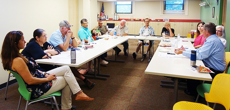 Local landlords and members of the Safe and Affordable Housing Taskforce discuss Callaway County's housing issues Tuesday evening. The SAHT is working to develop a safety checklist for landlords and tenants to use together.