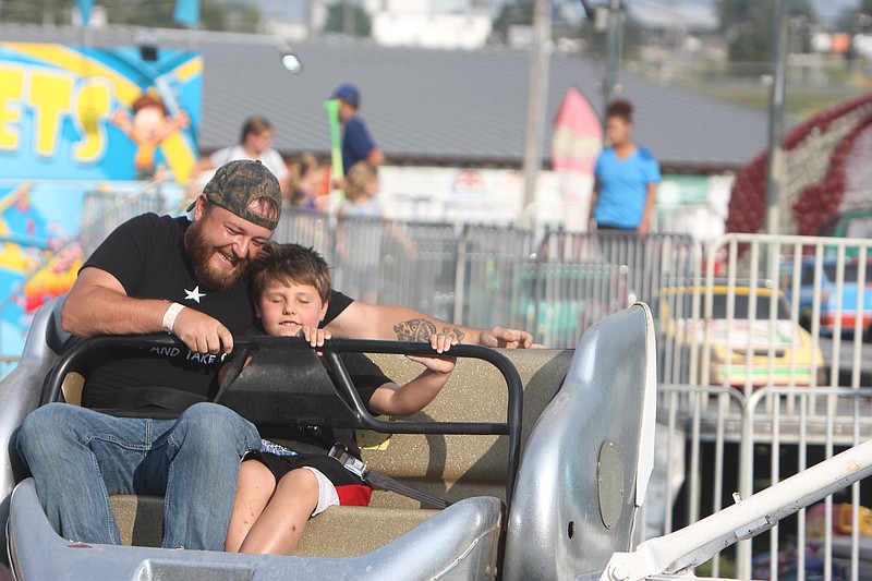 Residents enjoy themselves at the Moniteau County Fair on Aug. 5, 2019.
