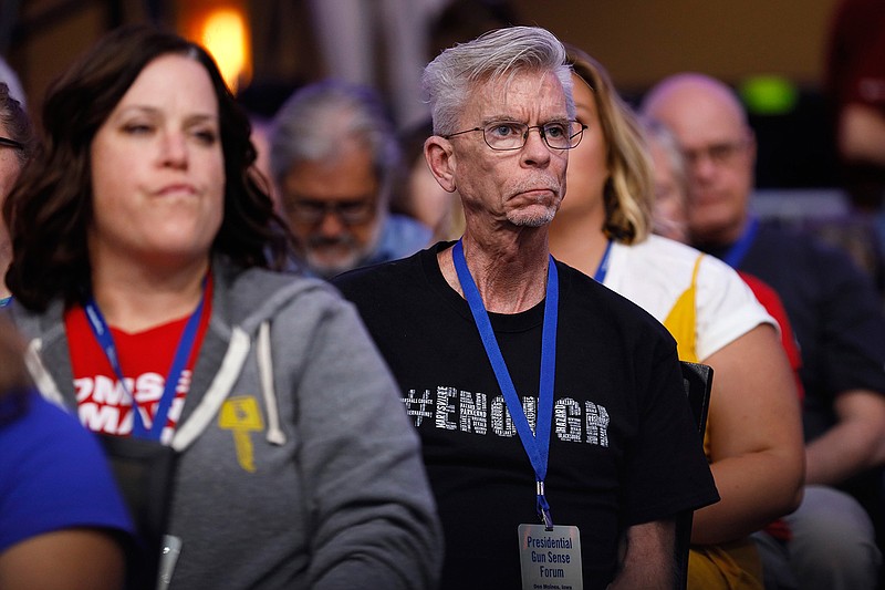 Audience members listen to Democratic presidential candidate Rep. Tim Ryan speak at the Presidential Gun Sense Forum, Saturday, Aug. 10, 2019, in Des Moines, Iowa. (AP Photo/Charlie Neibergall)