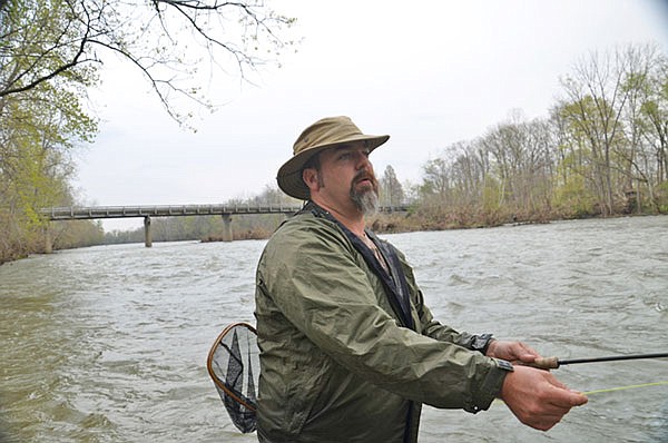 Paddle Don Cranfill pursues smallmouth bass on the Driftwood River in Indiana.