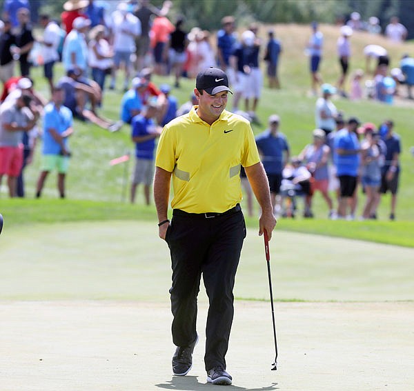 Patrick Reed approaches the fourth green during Saturday's third round of the Northern Trust at Liberty National Golf Course in Jersey City, N.J.