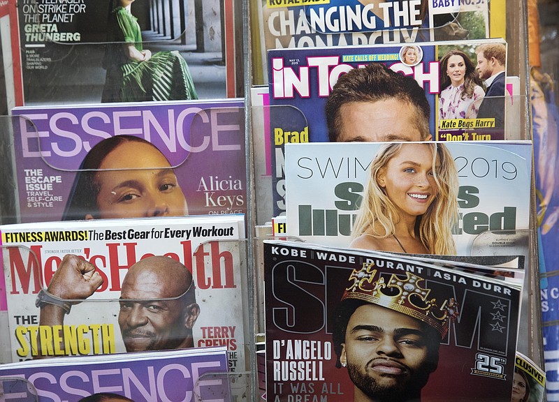 FILE - In this May 28, 2019, file photo, an issue of Sports Illustrated is displayed on a newsstand in New York. BlackRock is taking a sizeable stake in the parent of Sports Illustrated and the retail chains Nine West and Aeropostale, becoming the company's largest shareholder. Financial terms were not disclosed. The Wall Street Journal, which first reported the deal Sunday, Aug. 11, 2019, cited anonymous sources who put the investment at $875 million, valuing the entertainment and marketing company at $4 billion, including debt. Authentic Brands Group has more than 50 brands and nearly $10 billion in annual global revenue. (AP Photo/Mark Lennihan, File)