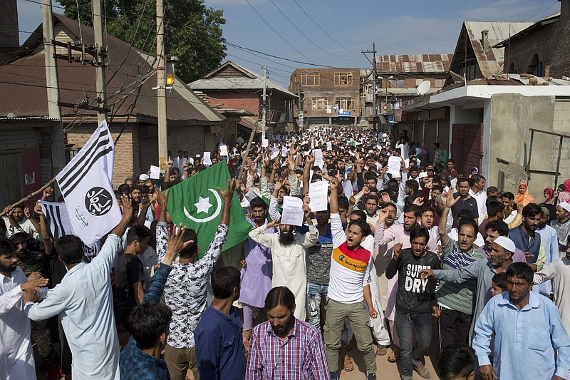 Kashmiri Muslims shout slogans during a protest after Eid prayers during a security lockdown in Srinagar, Indian controlled Kashmir, Monday, Aug. 12, 2019. Hundreds of worshippers gathered after the prayers and chanted "We want freedom" and "Go India, Go back," witnesses said. Officials said the protest ended peacefully. (AP Photo/ Dar Yasin)