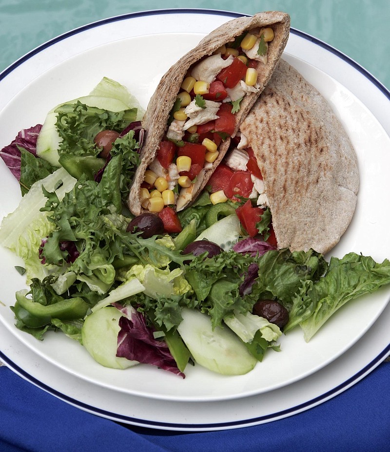 Chicken Pita Pocket with Tomato and Corn Salsa and Greek Summer Salad for Linda Gassenheimer's dinner in minutes. (Al Diaz/Miami Herald/TNS)