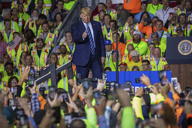 President Donald Trump walks on stage before speaking to a crowd of construction workers before touring Royal Dutch Shell's petrochemical cracker plant on Tuesday, Aug. 13, 2019 in Monaca, Pa. (Andrew Rush/Post-Gazette via AP)