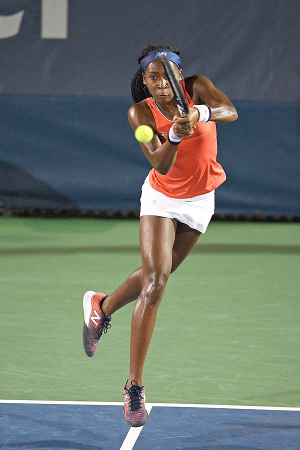 Cori "Coco" Gauff returns the ball as she and Catherine McNally played a doubles match against Anna Kalinskaya and Miyu Kato in the Citi Open last Friday in Washington.