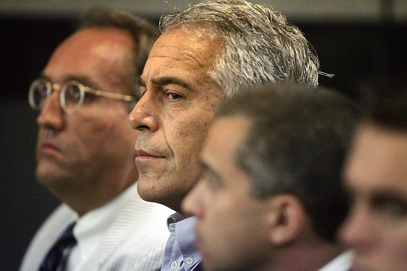 In this July 30, 2008 file photo, Jeffrey Epstein appears in court in West Palm Beach, Fla. Epstein has died by suicide while awaiting trial on sex-trafficking charges, says person briefed on the matter, Saturday, Aug. 10, 2019. (AP Photo/Palm Beach Post, Uma Sanghvi, File)