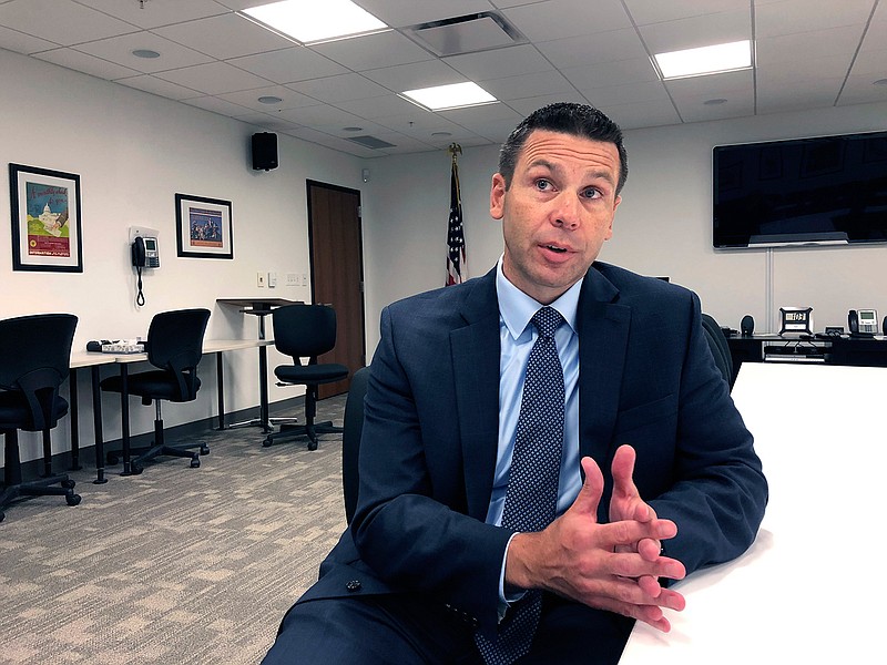 Kevin K. McAleenan, U.S. acting secretary of Homeland Security, speaks Tuesday, Aug. 13, 2019, at a federal building in Jackson, Miss. McAleenan said "violent white supremacist ideology" is fueling some domestic terrorism. (AP Photo/Emily Wagster Pettus)