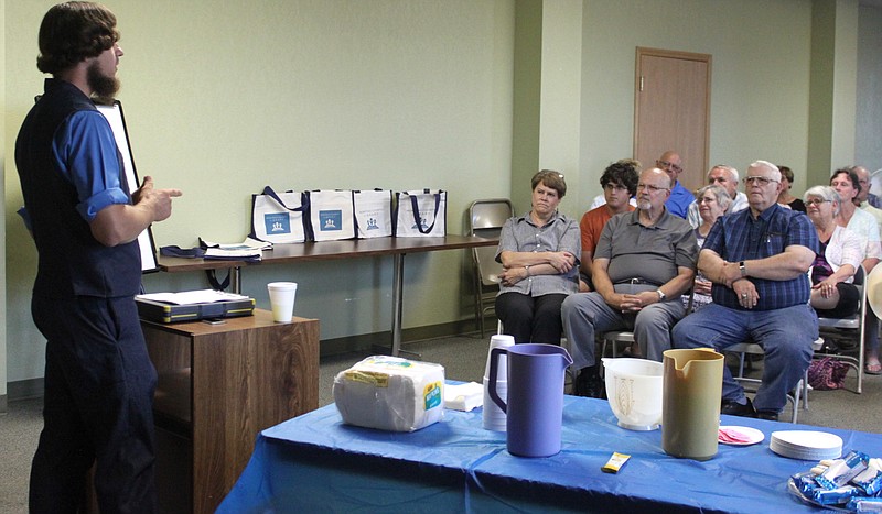 <p>Democrat photo/Liz Morales</p><p>Sam Shetler, a member of the Amish community, speaks to attentive listeners at the Moniteau County Library Aug. 13. Shetler spoke about a variety of topics pertaining to his Amish background, from the history of the Amish to the group’s views on voting and modernism.</p>