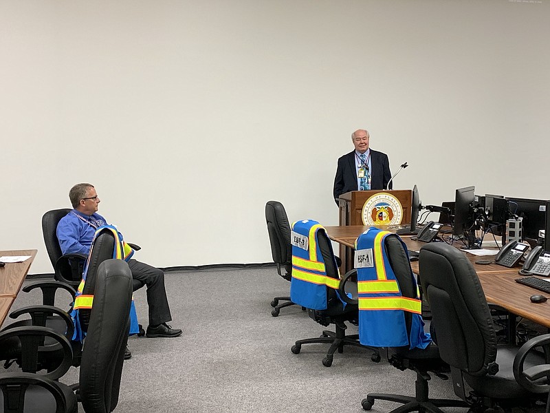 <p>Quinn Wilson/FULTON SUN</p><p>FEMA Region 7 chief of technological hazards branch, Thomas Morgan, left, and NRC Region 4 senior inspector of emergency preparedness, Paul Elkmann, right, address the room at the Missouri State Emergency Management Agency in Jefferson City. The press conference was held to discuss the preliminary findings of a nuclear emergency preparedness exercise held Tuesday at the Callaway Energy Center.</p>