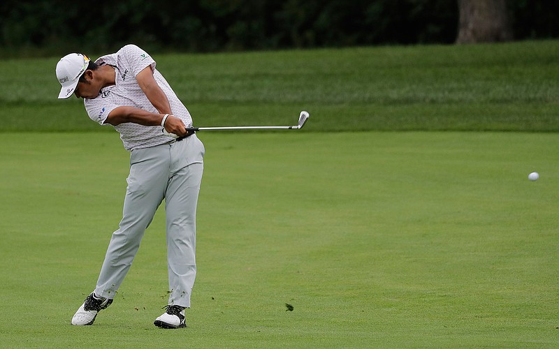 Hideki Matsuyama, of Japan, hits his second shot on the fifth hole during the second round of the BMW Championship golf tournament at Medinah Country Club, Friday, Aug. 16, 2019, in Medinah, Ill. (AP Photo/Nam Y. Huh)