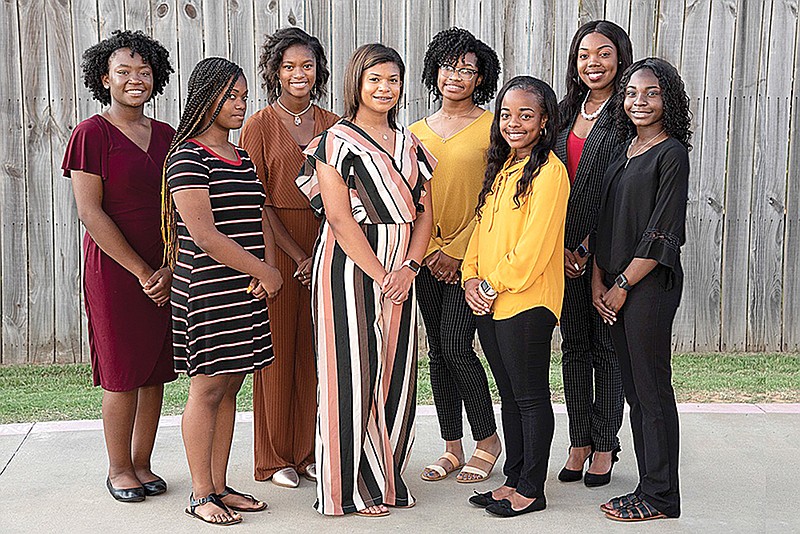 Pictured from left, Raven Burns, Kennedi Harris, Taylor Wilkerson, Jayla Bayonne, Kiana Smith, Fortunate Barry, Taylor Williams, Felixsa Lewis. (Photo by John Mullens)
