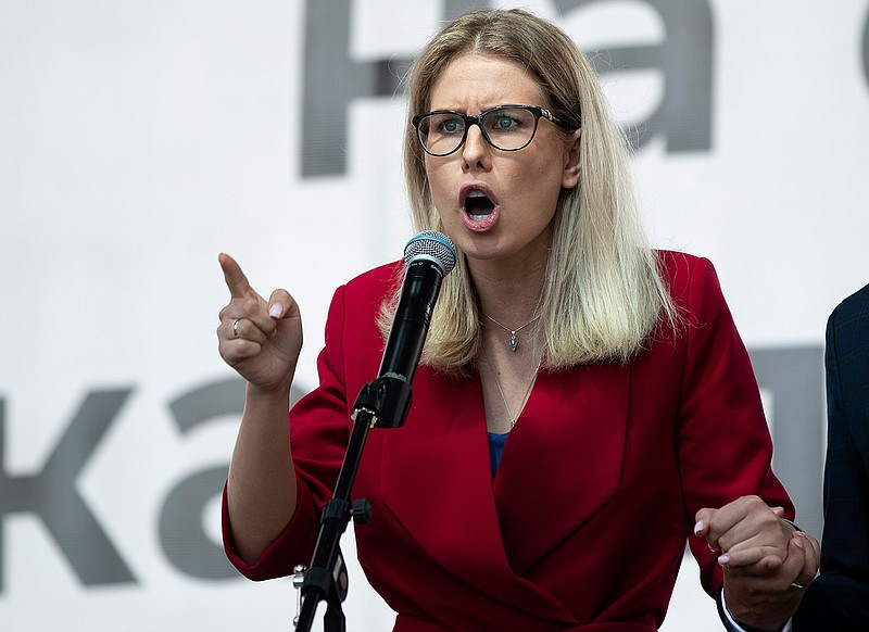 In this file photo taken on July 20, 2019, Russian opposition candidate and lawyer at the Foundation for Fighting Corruption Lyubov Sobol speaks to a crowd during a protest in Moscow, Russia. This summer's wave of opposition protests has pushed Sobol to the forefront of the Russian political scene. (AP Photo/Pavel Golovkin, File)