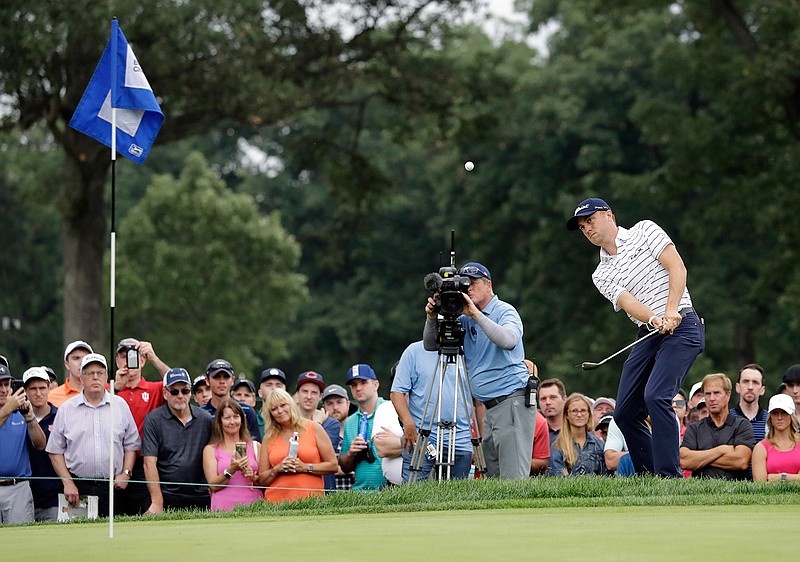 Justin Thomas chips an approach shot on the 14th hole during the third round of the BMW Championship golf tournament at Medinah Country Club, Saturday, Aug. 17, 2019, in Medinah, Ill. (AP Photo/Nam Y. Huh)