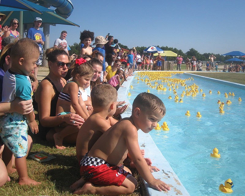 Spectators gather Saturday for the Great Texarkana Duck Race at Holiday Springs Water Park.