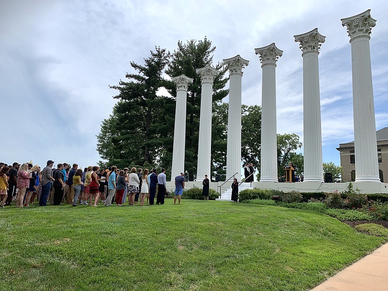 New students at Westminster College gather in front of the original columns of Westminster Hall, which burned down in a fire in 1909. The columns ceremony is the official welcome to the community at Westminter as this is the only time students will pass through the columns before their graduation.