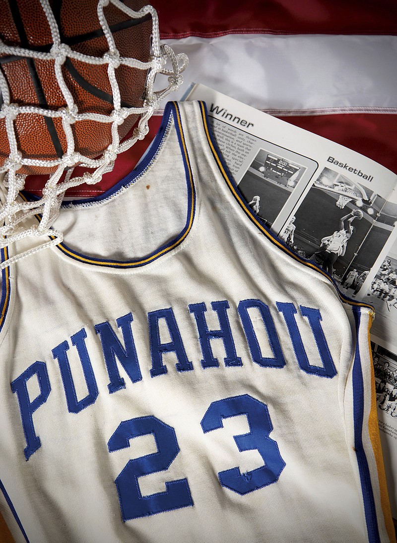 This undated photo released by Heritage Auctions shows a Punahou High School basketball jersey worn by former student Barack Obama. Bidding was drawing to a close Friday, Aug. 16, 2019, for the basketball No. 23 Punahou School jersey believed to have been worn by President Barack Obama. Obama the wore that number during the 1978-79 school year in Honolulu. (Heritage Auctions via AP)