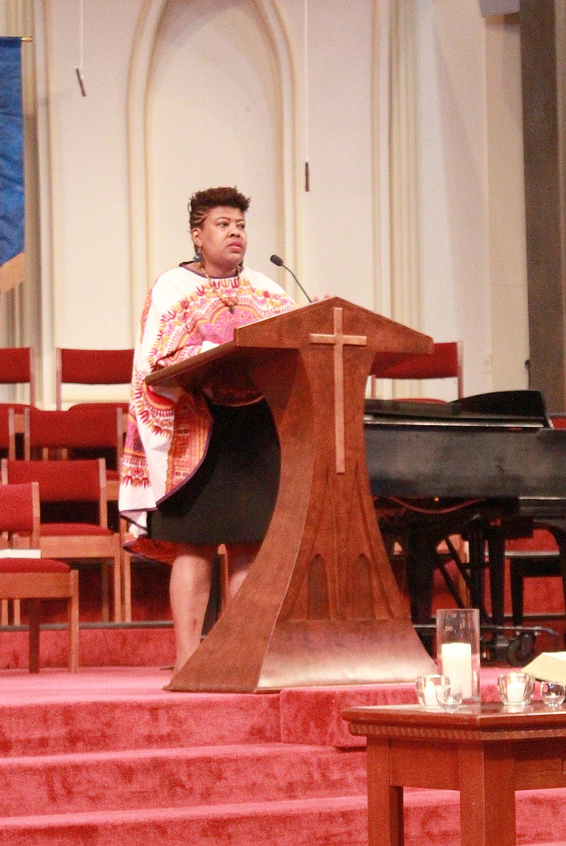 The Rev. Cassandra Gould spoke about "Reflections on a Pilgrimage," Monday during the Angela Project Community Worship at First Baptist Church. She explained the work of the church is to change the course of history. 