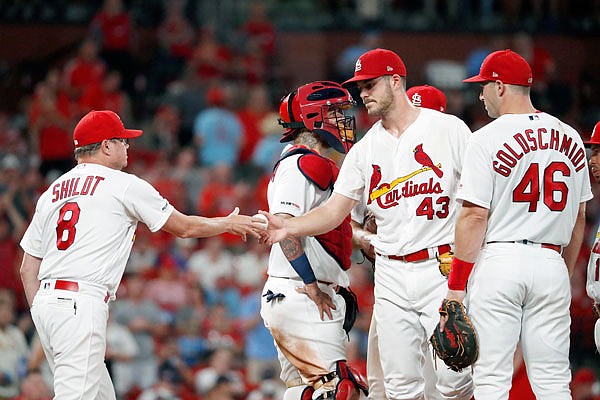 Cardinals starting pitcher Dakota Hudson is removed by manager Mike Shildt during the seventh inning of Monday night's game against the Brewers at Busch Stadium.
