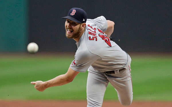 Red Sox pitcher Chris Sale throws to the plate during a game last week against the Indians in Cleveland.