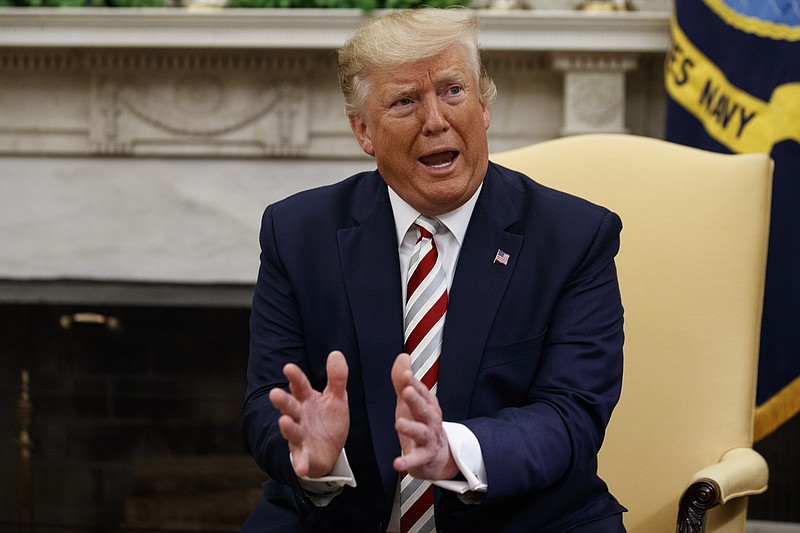 President Donald Trump speaks during a meeting with Romanian President Klaus Iohannis in the Oval Office of the White House, Tuesday, Aug. 20, 2019, in Washington. (AP Photo/Alex Brandon)